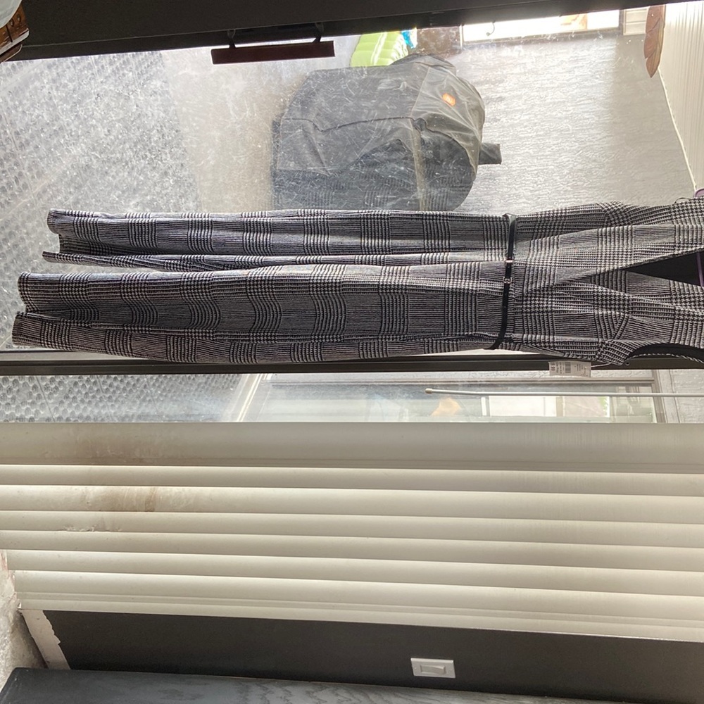 Size 6 Black and White Jumpsuit with Belt included